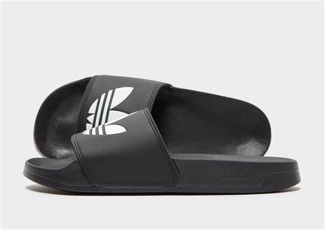 all black adidas slides